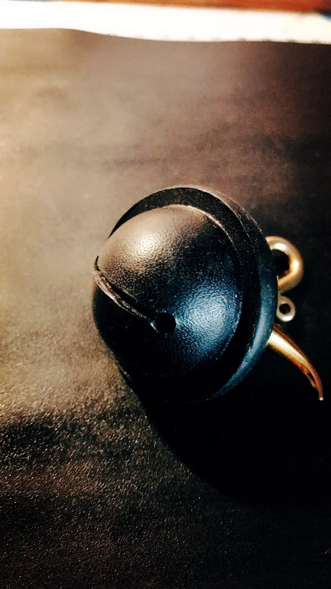 Black Leather Bell Charm with Gold Horns