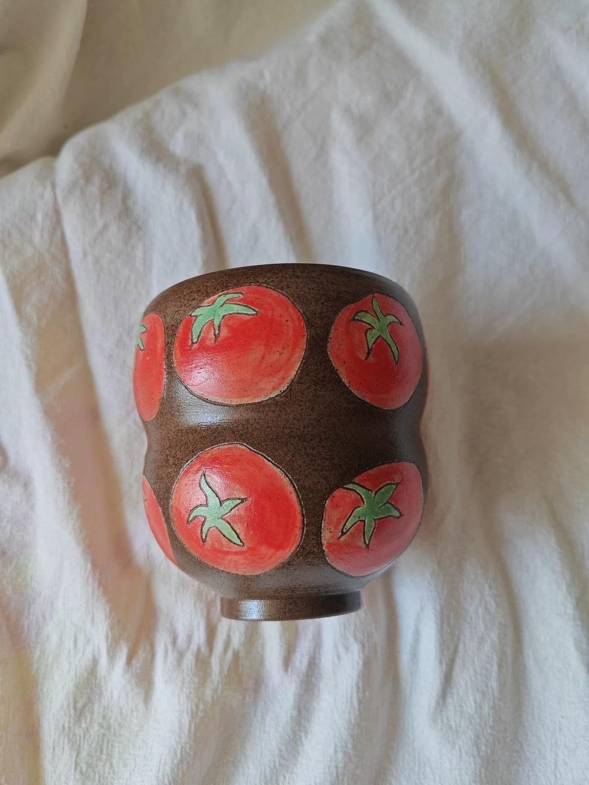 Handmade Black Pottery Coffee Cup with Tomato Motif