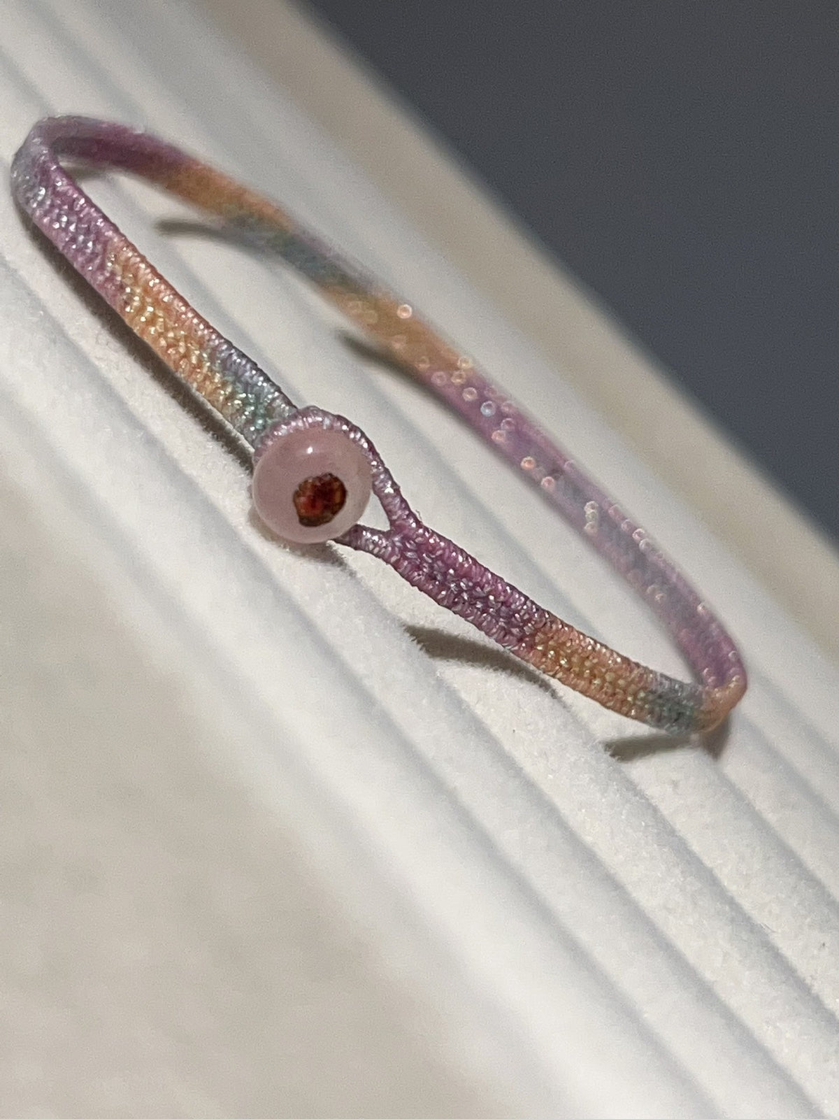 Keerbare armband van space-dyed waskoord
