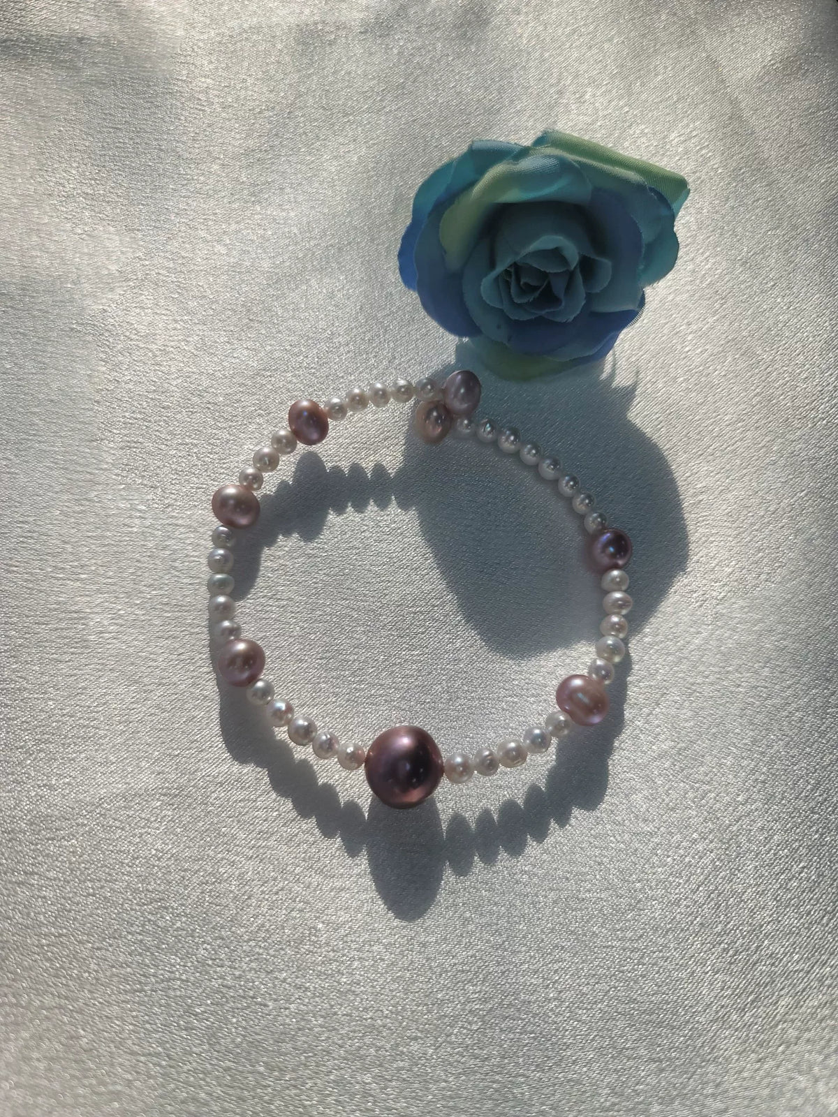 Bracelet en perles d'eau douce naturelles dégradé rose-violet