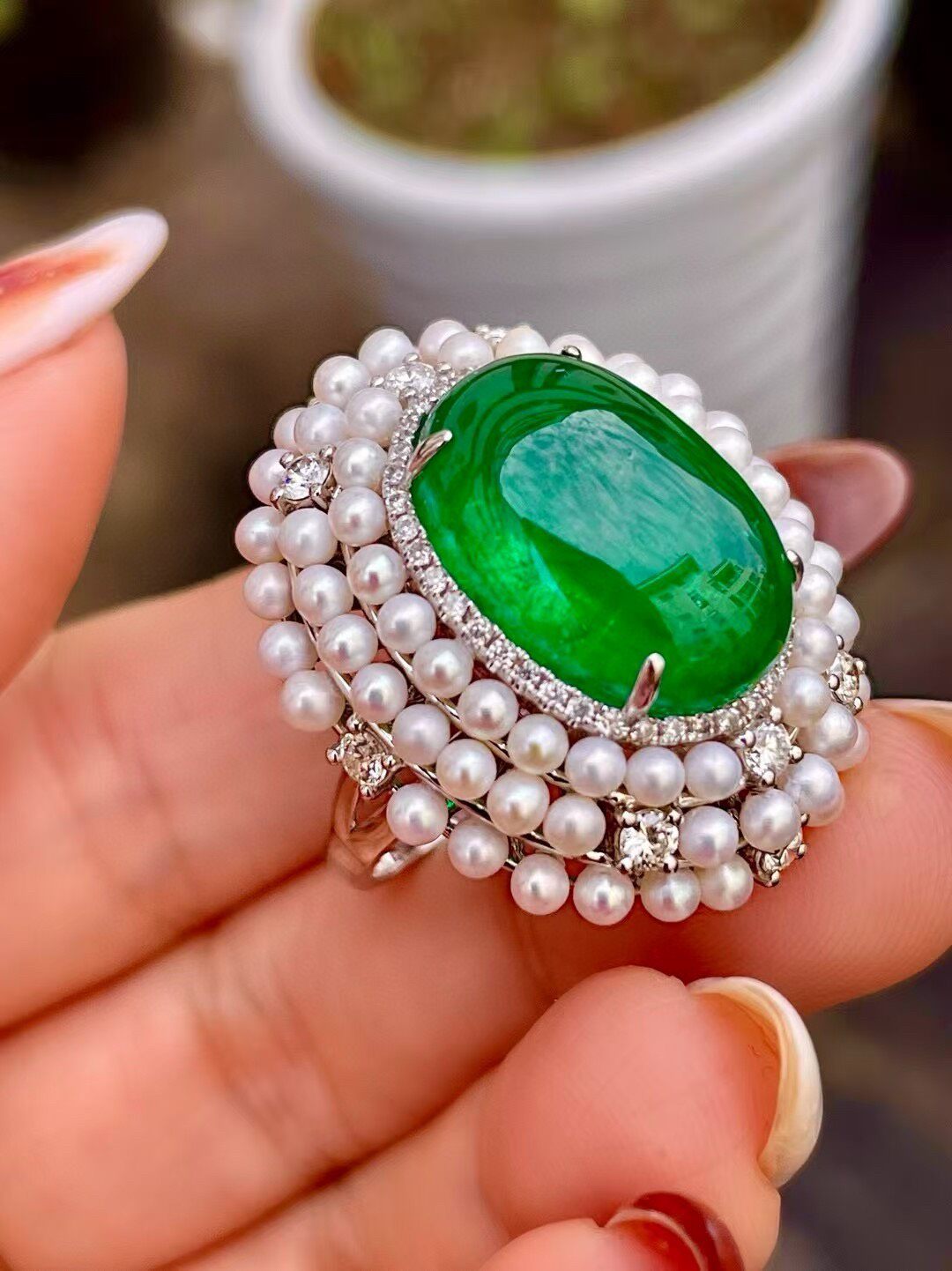 18k Gold Ring with 11.8ct Cabochon Emerald, 0.71ct Diamond Halo, and Pearl Border