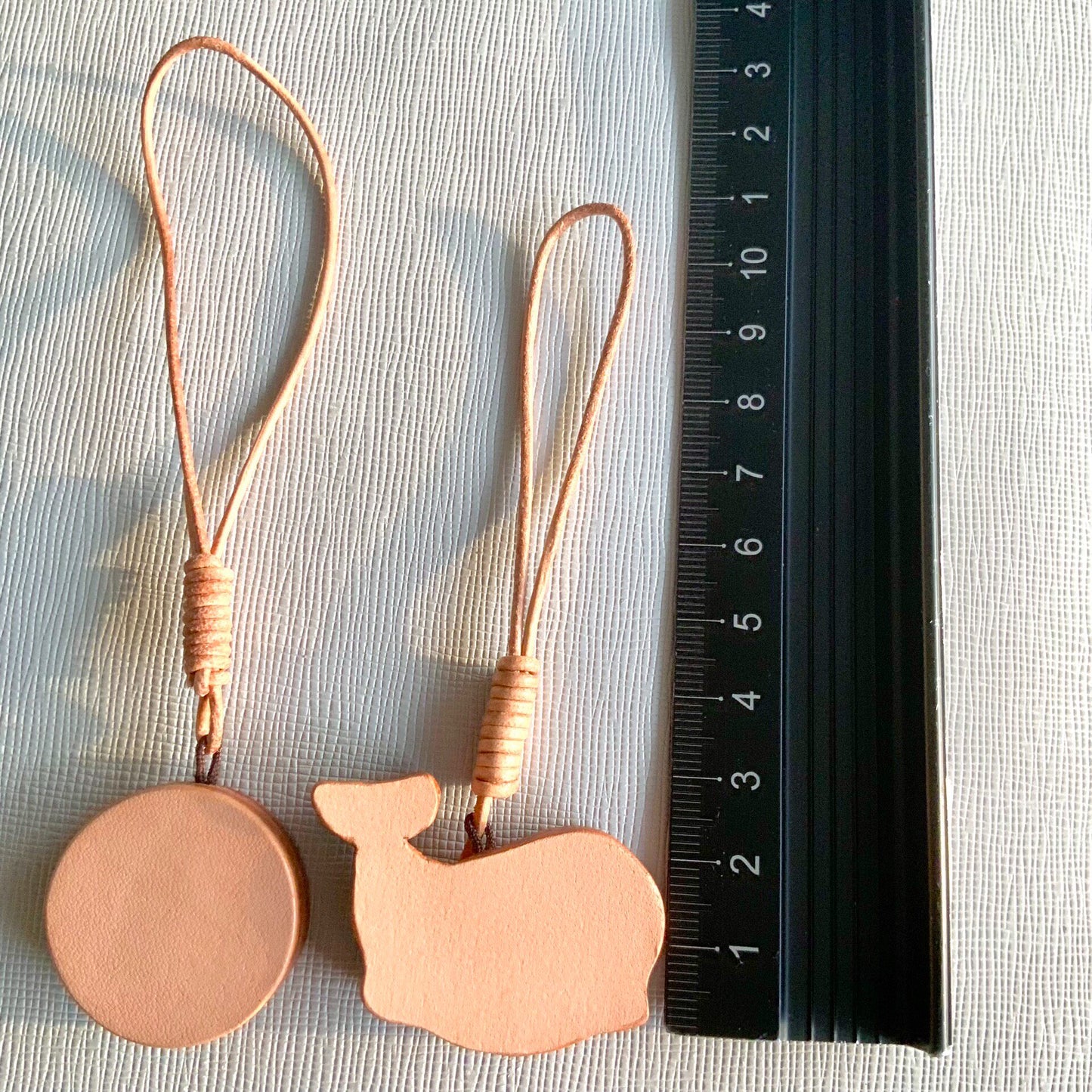 Handcrafted Leather Pendants: "BE HAPPY" Disc and Whale Charm