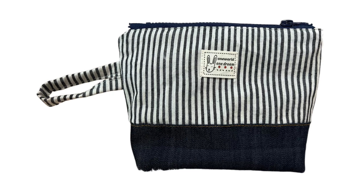 Pochette zippée patchwork denim rayé