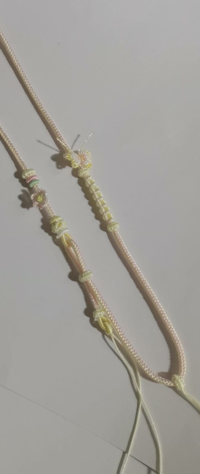 Cordon de collier tressé artisanal dégradé rose et vert