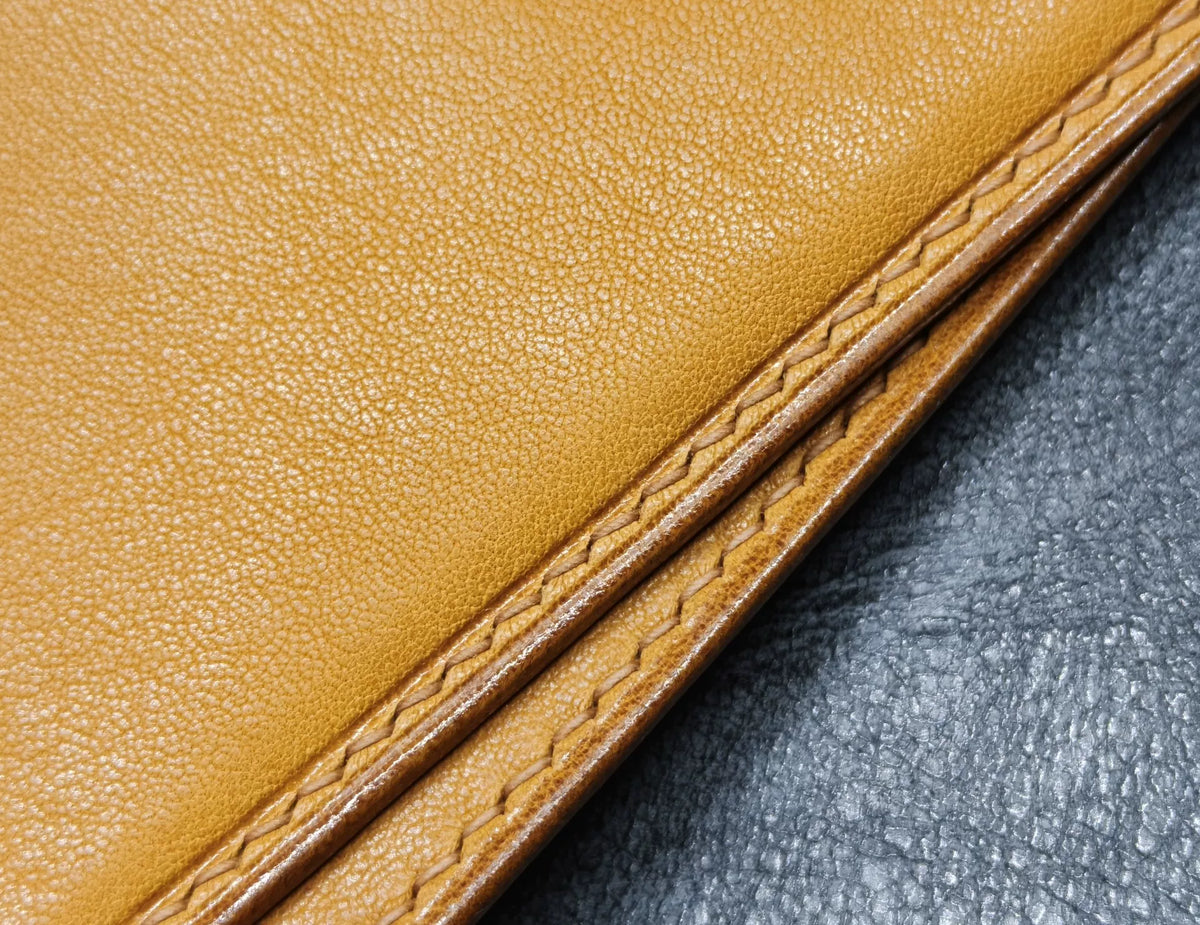 Couverture de carnet A7 pages fixes en cuir doré