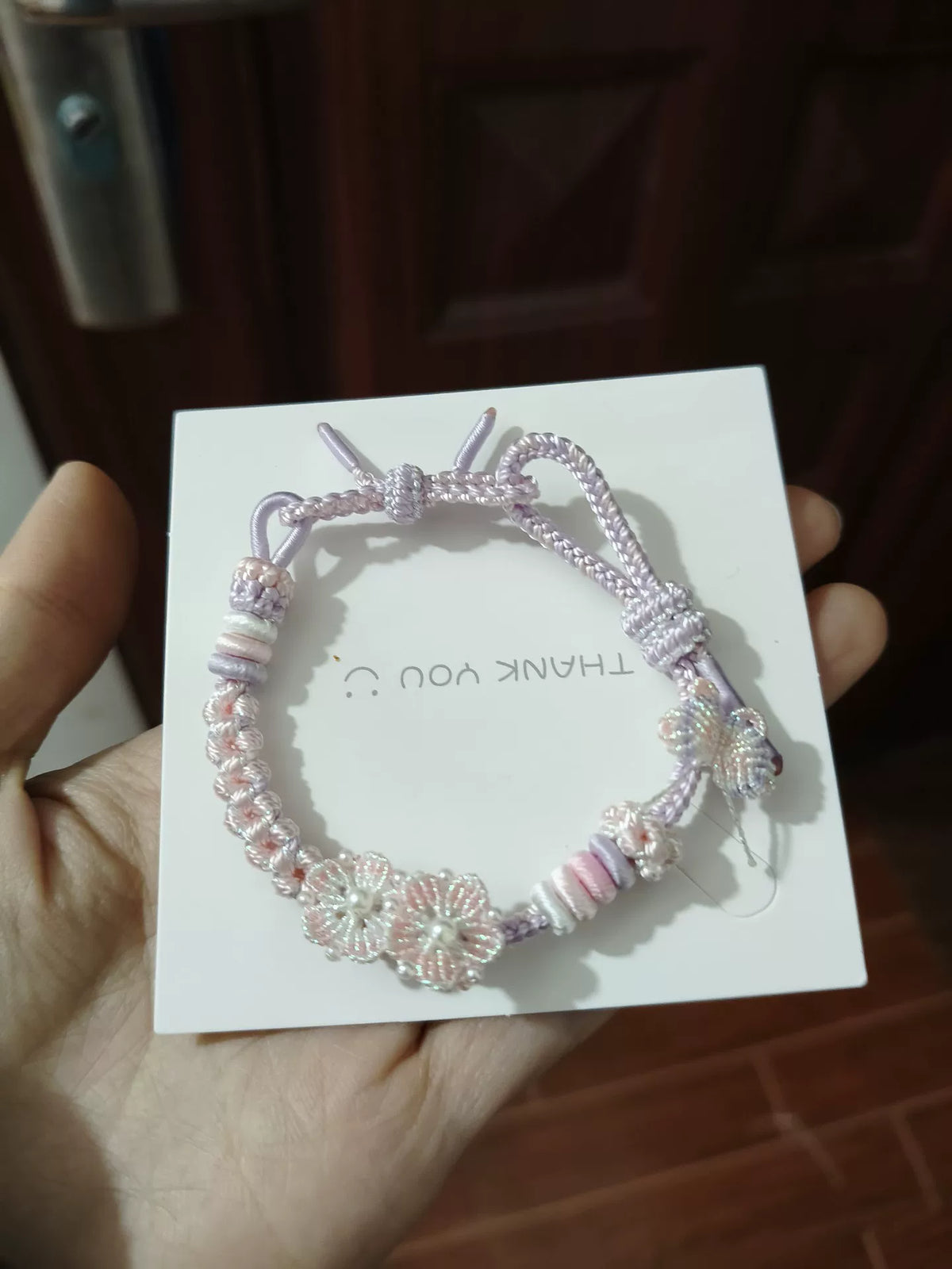 Pulseira de Flor em Cordão Trançado Rosa e Branco