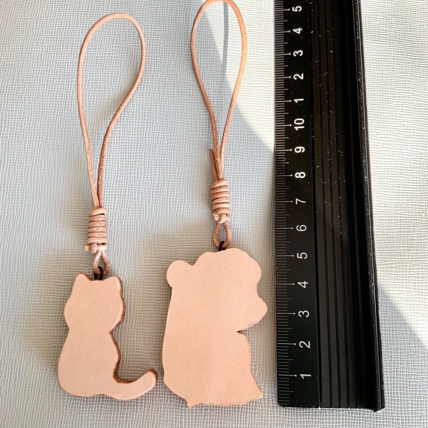 Two Thick Leather Keychain Pendants: Black Cat and Blonde Girl