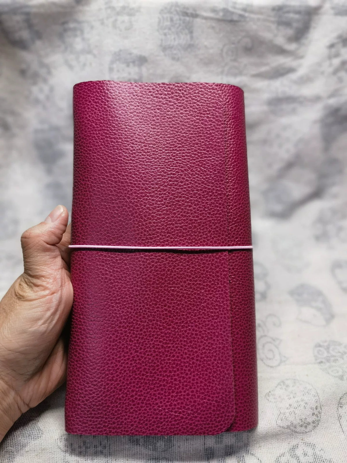Copertina per agenda a tripiega in pelle rosa magenta