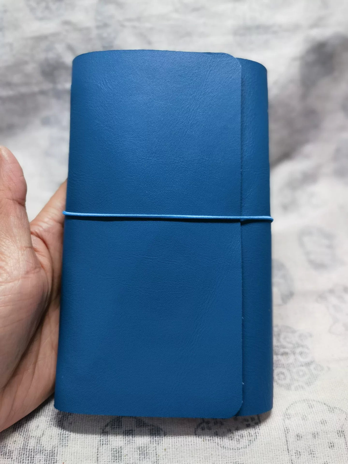Blått läderomslag för traveler's notebook