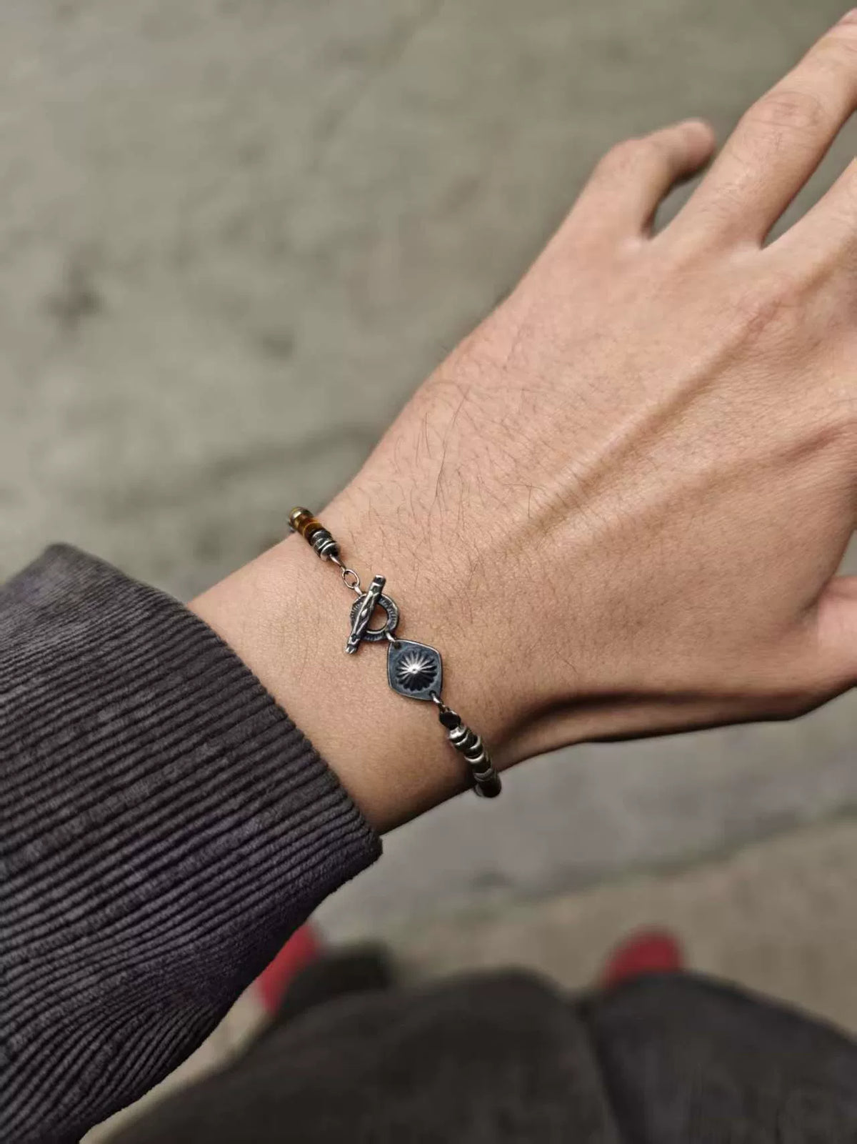 Braccialetto in occhio di tigre e argento 925 stile Navajo