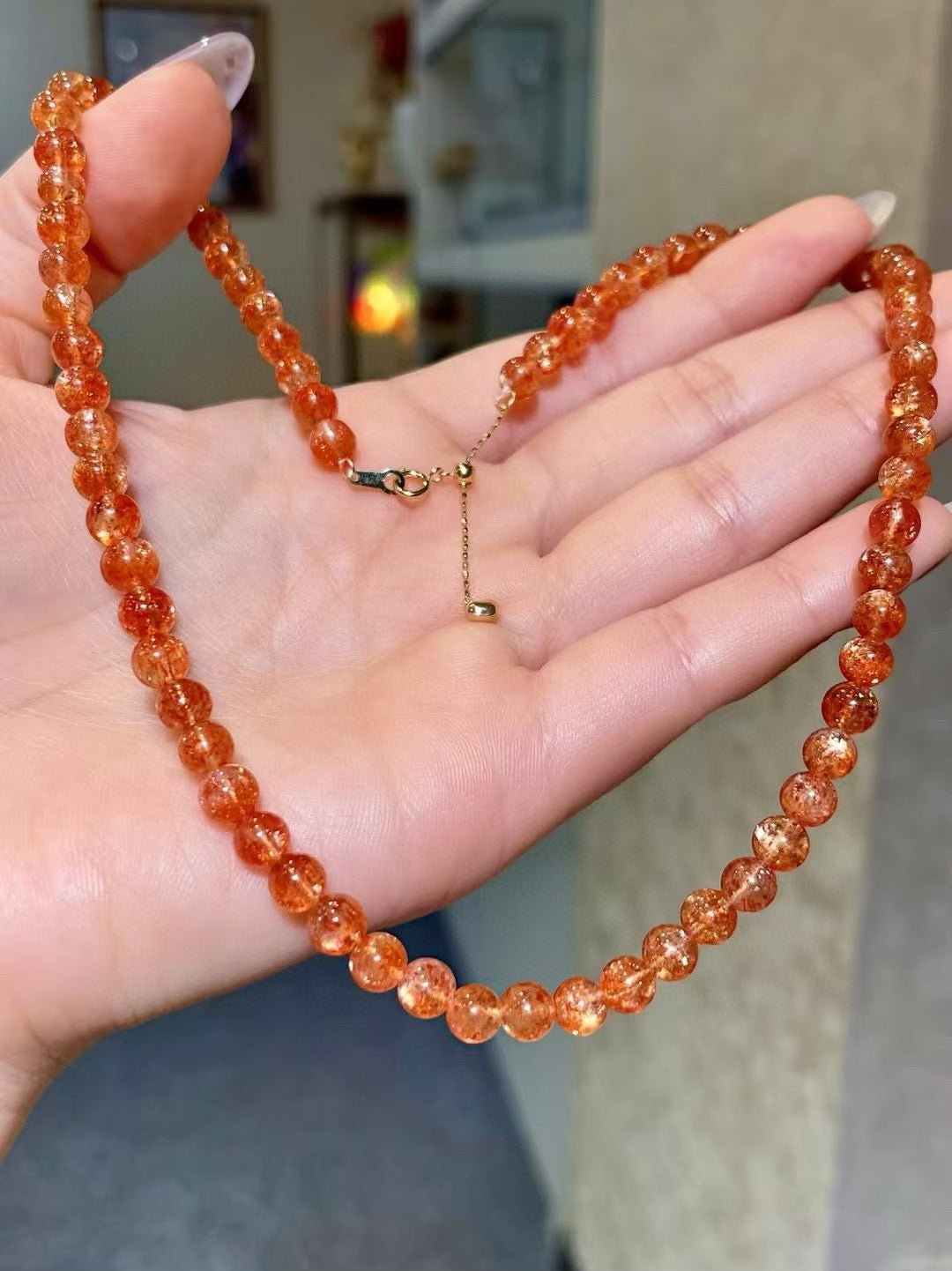 18k Gold Clasp Orange Bead Necklace with Golden Needle Inclusions 5.5-6mm