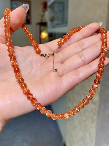 18k Gold Clasp Orange Bead Necklace with Golden Needle Inclusions 5.5-6mm