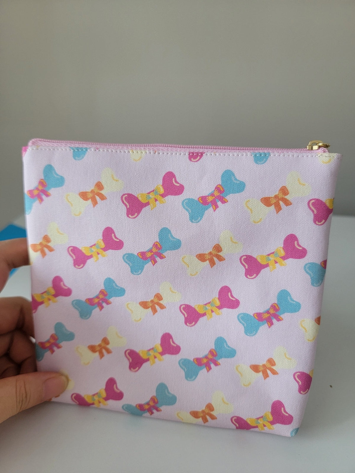 Bone Print Bow Zipper Pouch
