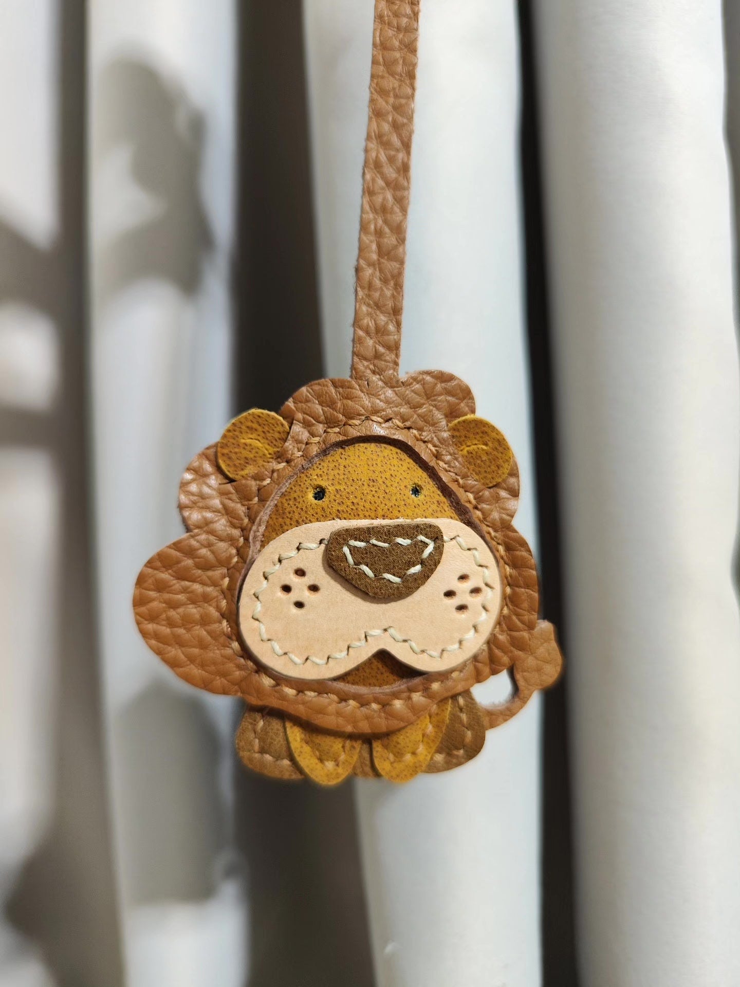 Lion-Shaped Leather Keychain with Detachable Paw Charm