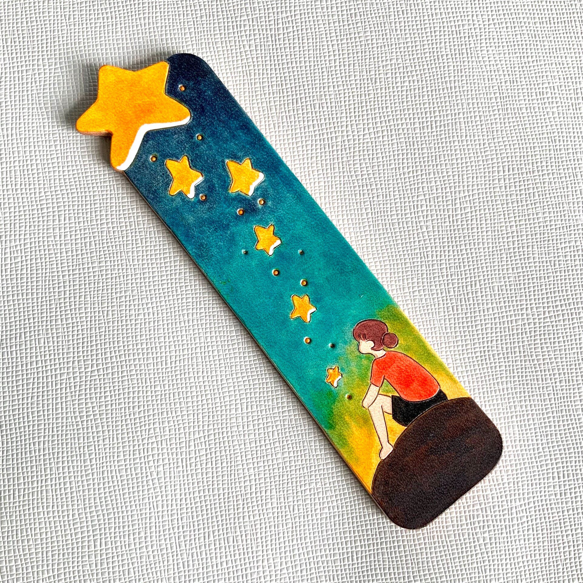 Hand-Painted Leather Bookmark with Star Cutouts