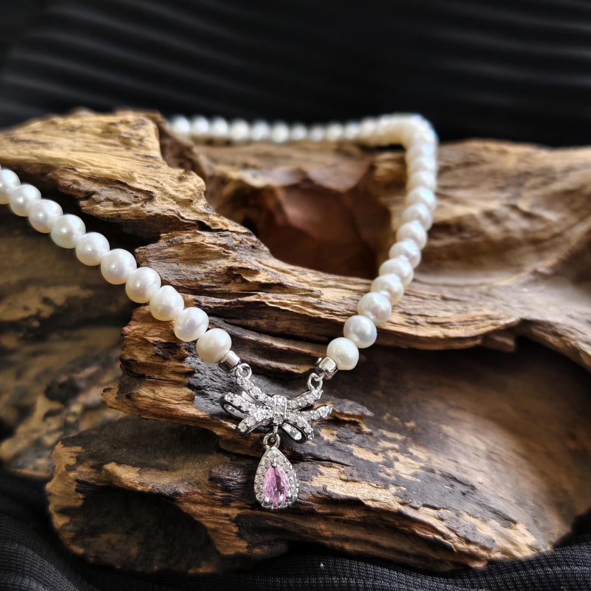 Pearl Necklace with Pink Bow Pendant