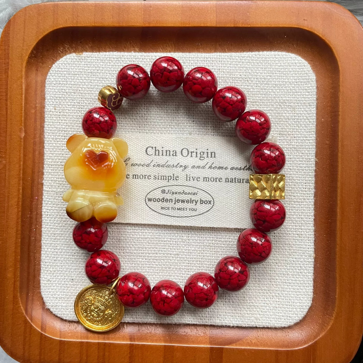 Pulsera con dije de oso en ambar de miel