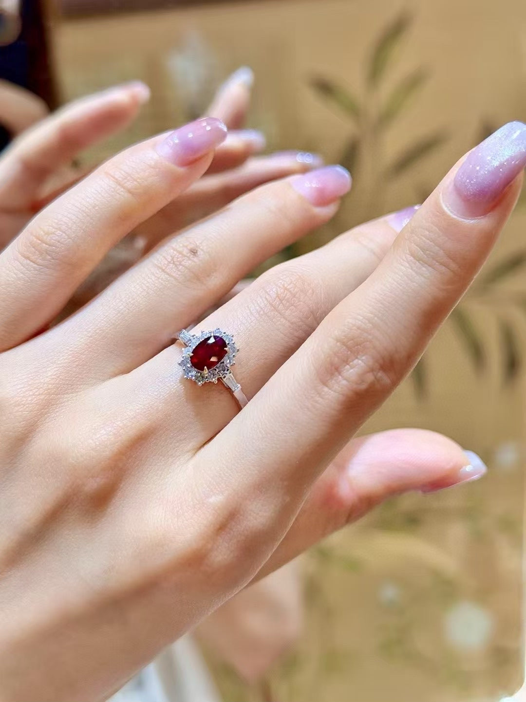 18K White Gold Ruby and Diamond Halo Ring with Baguette Shoulders