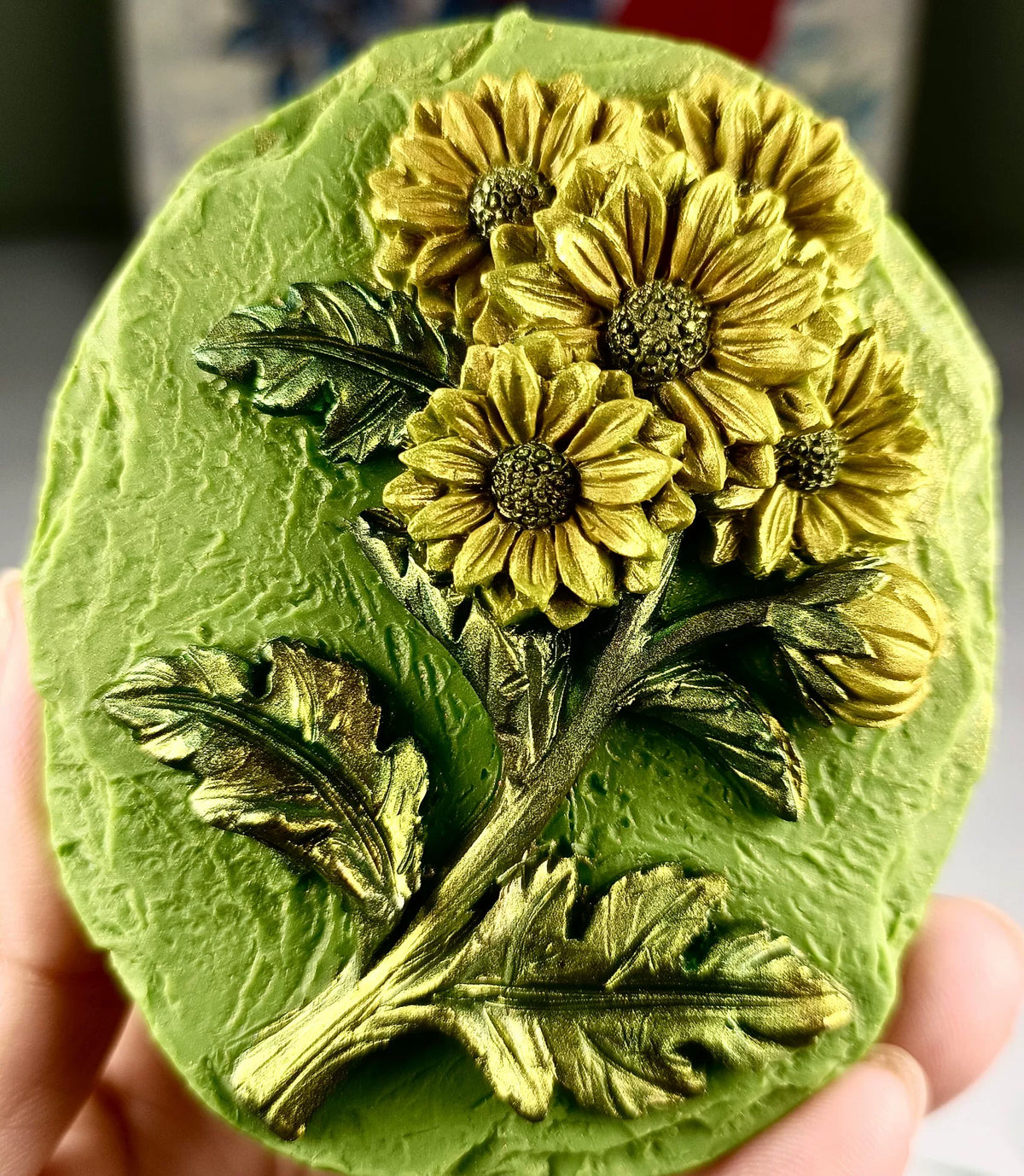 Sieradjesbox van hars met gouden bloemen deksel