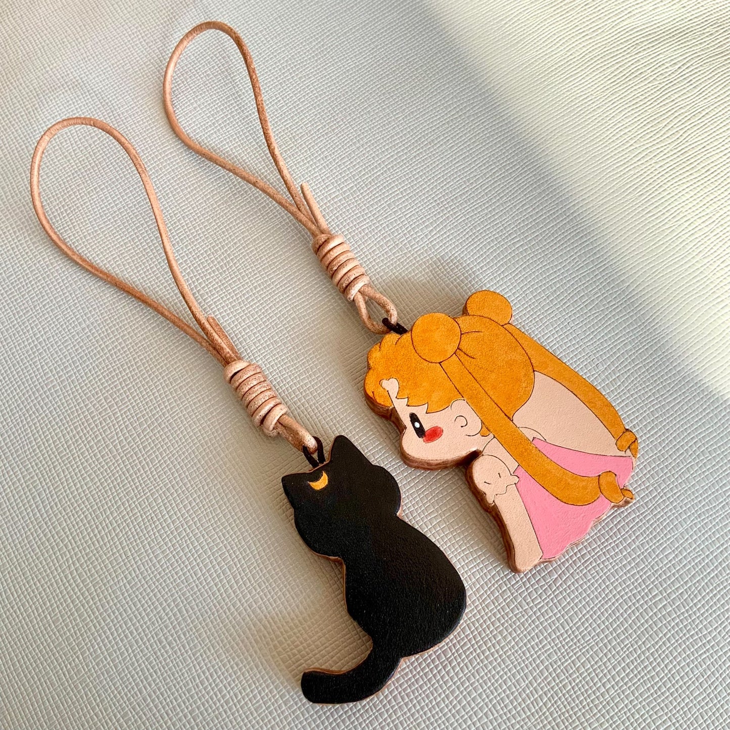 Two Thick Leather Keychain Pendants: Black Cat and Blonde Girl