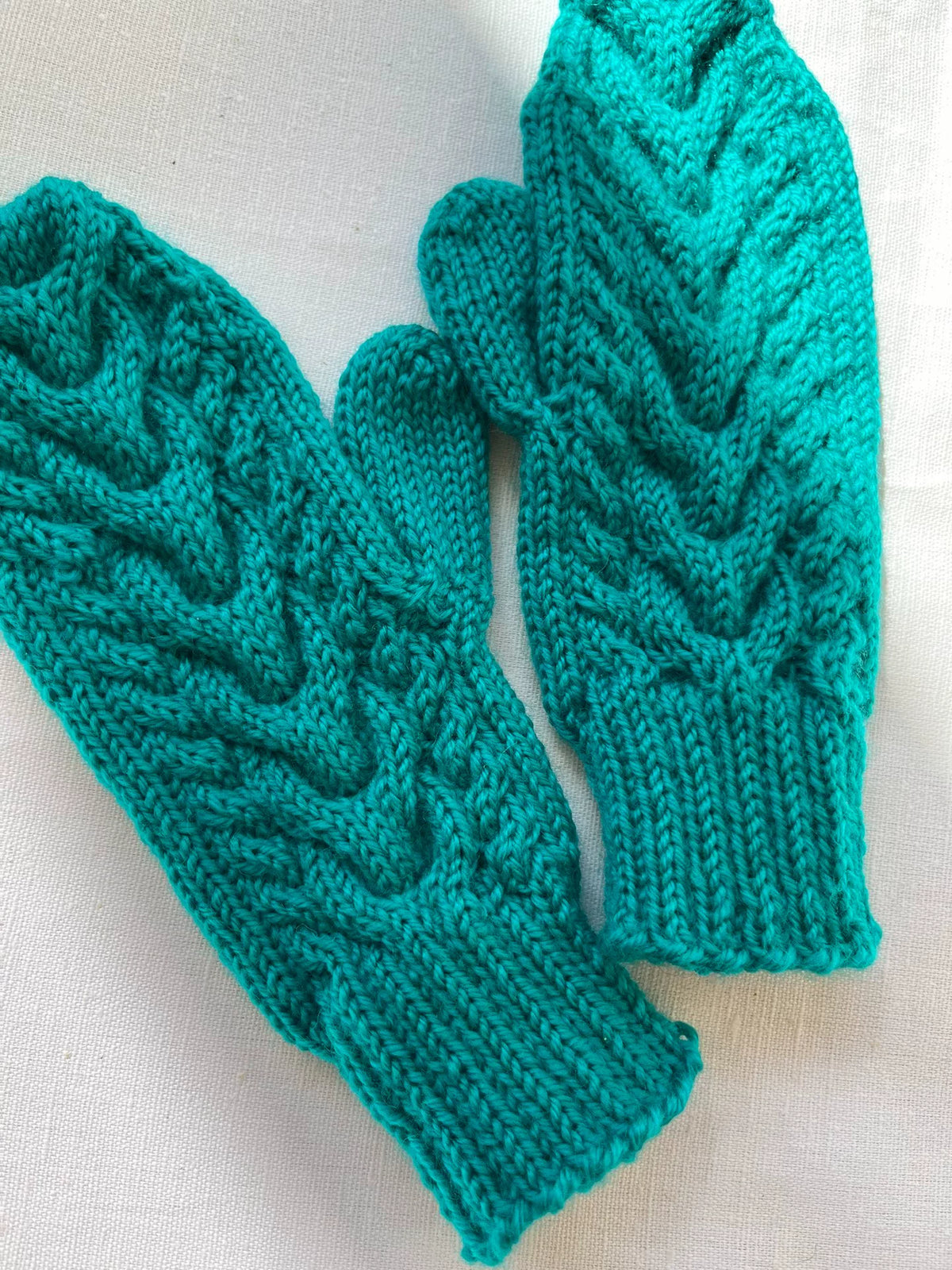 Guantes sin dedos de lana pura tejidos a mano en verde teal