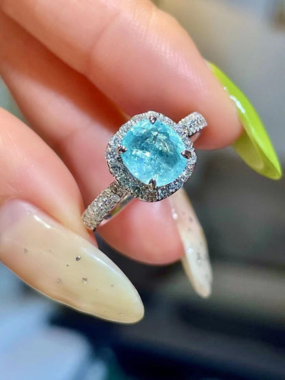 18k Gold Ring with 1.1ct Neon Blue Cushion-Cut Gemstone and 0.41ct Diamond Halo