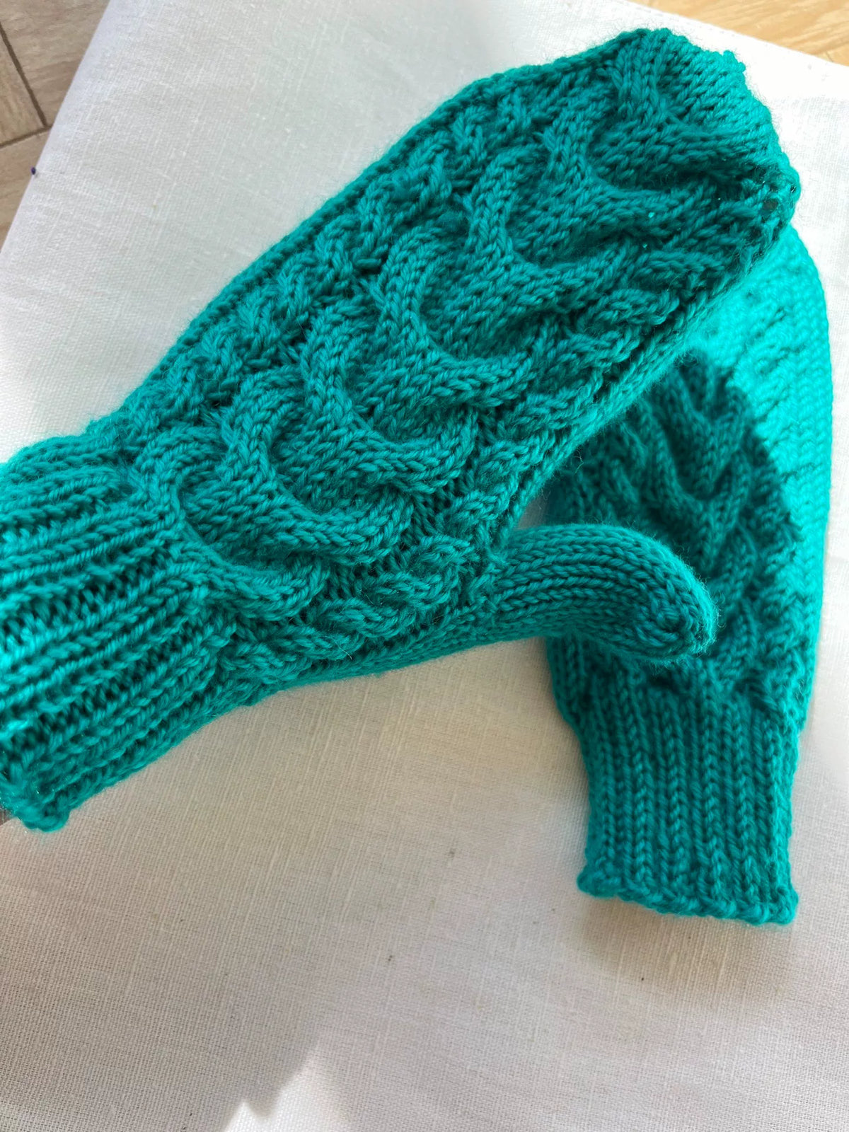 Guantes sin dedos de lana pura tejidos a mano en verde teal