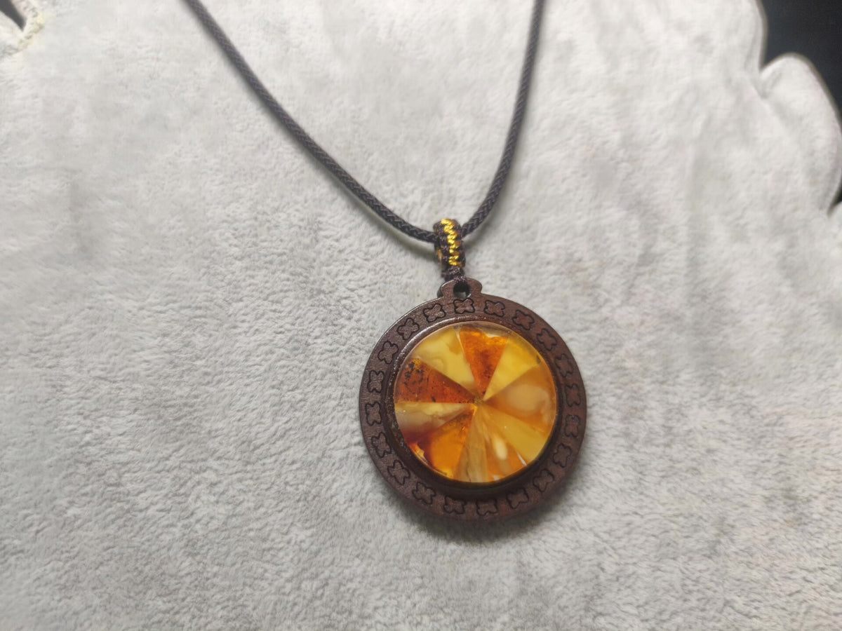 Spliced Amber Pendant with Wooden Frame