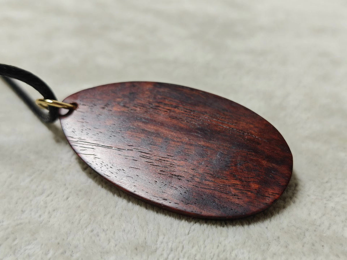 Myanmar Rosewood Amber Eye Pendant