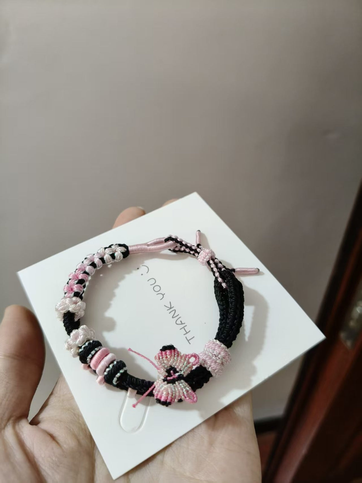 Handwoven Black Pink Gradient Bracelet with Butterfly Charm