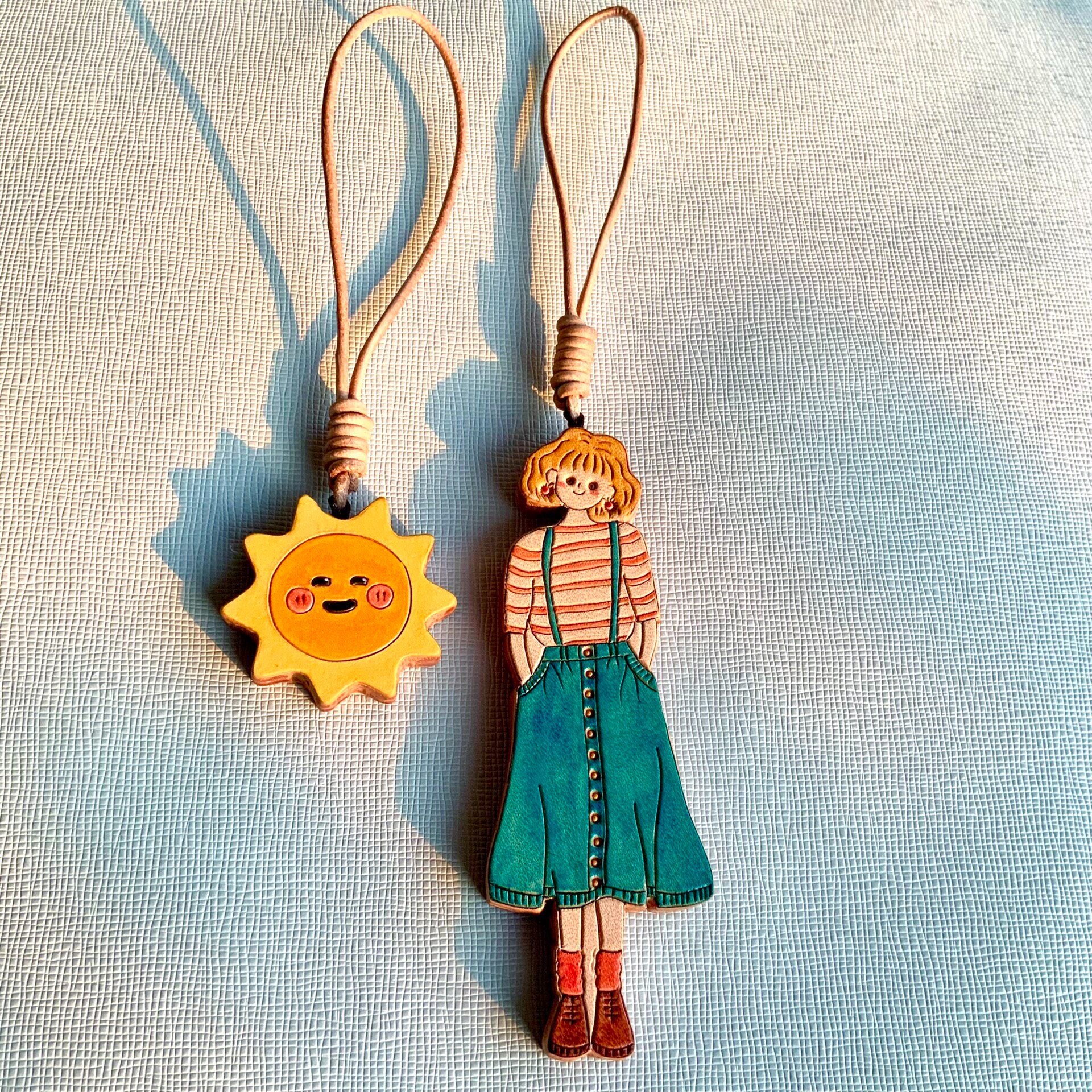 Hand-Painted Leather Girl and Sun Bag Charms