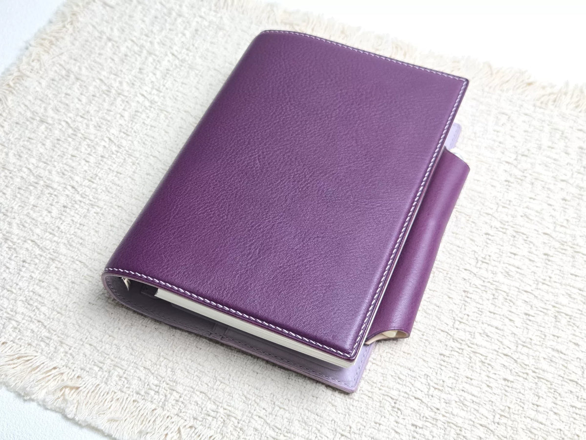 Carpeta agenda de cuero granulado púrpura