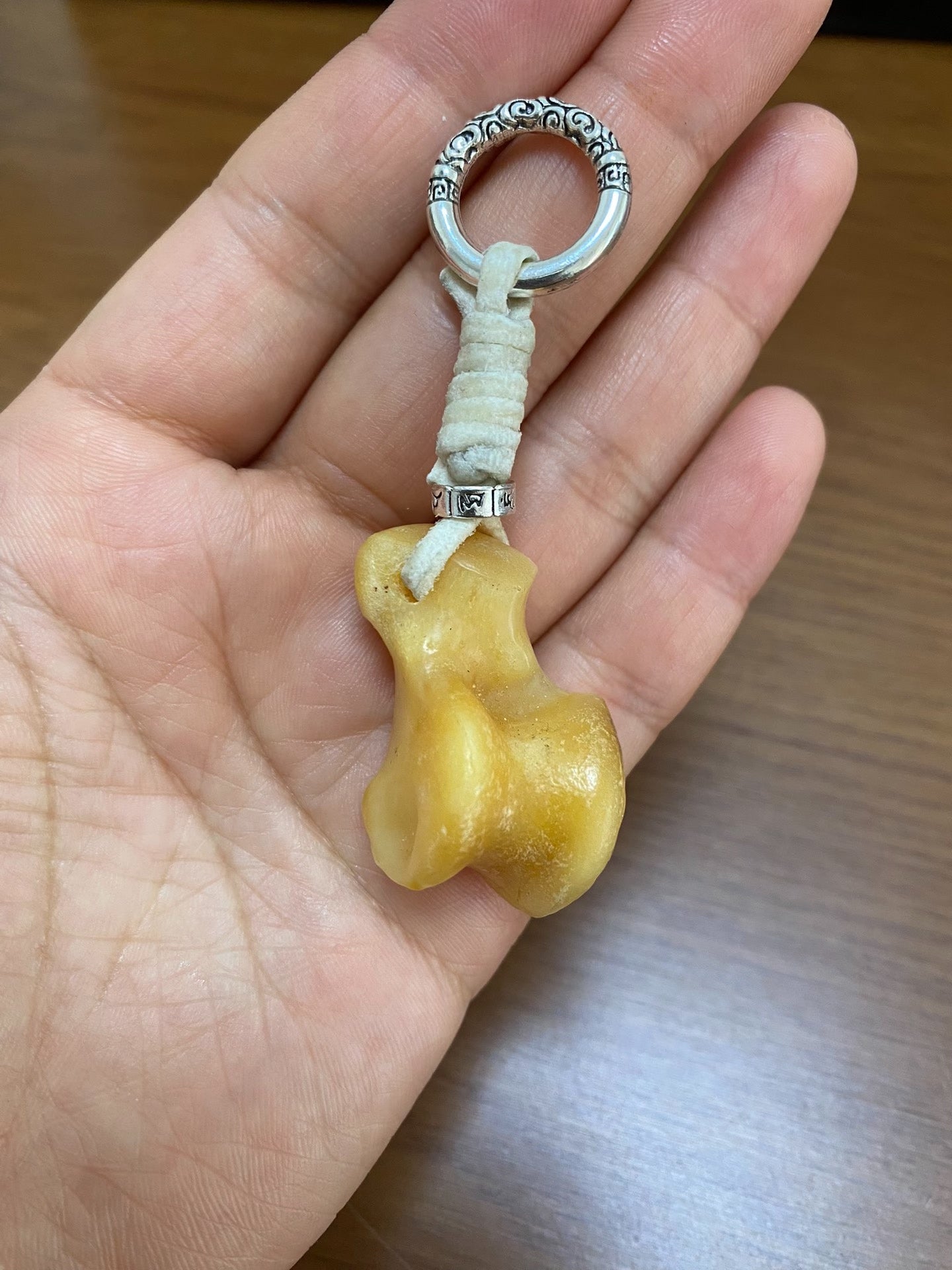 Handcrafted Bone-Shaped Pendant Keychain with White Cord and Silver-Toned Ring