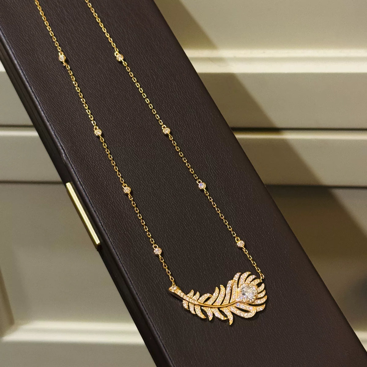 Colier plume en argent 925 plaqué or
