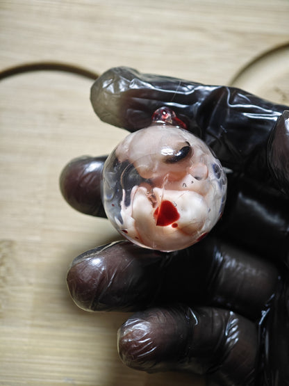 Resin Spherical Pendant with Embryonic Figure