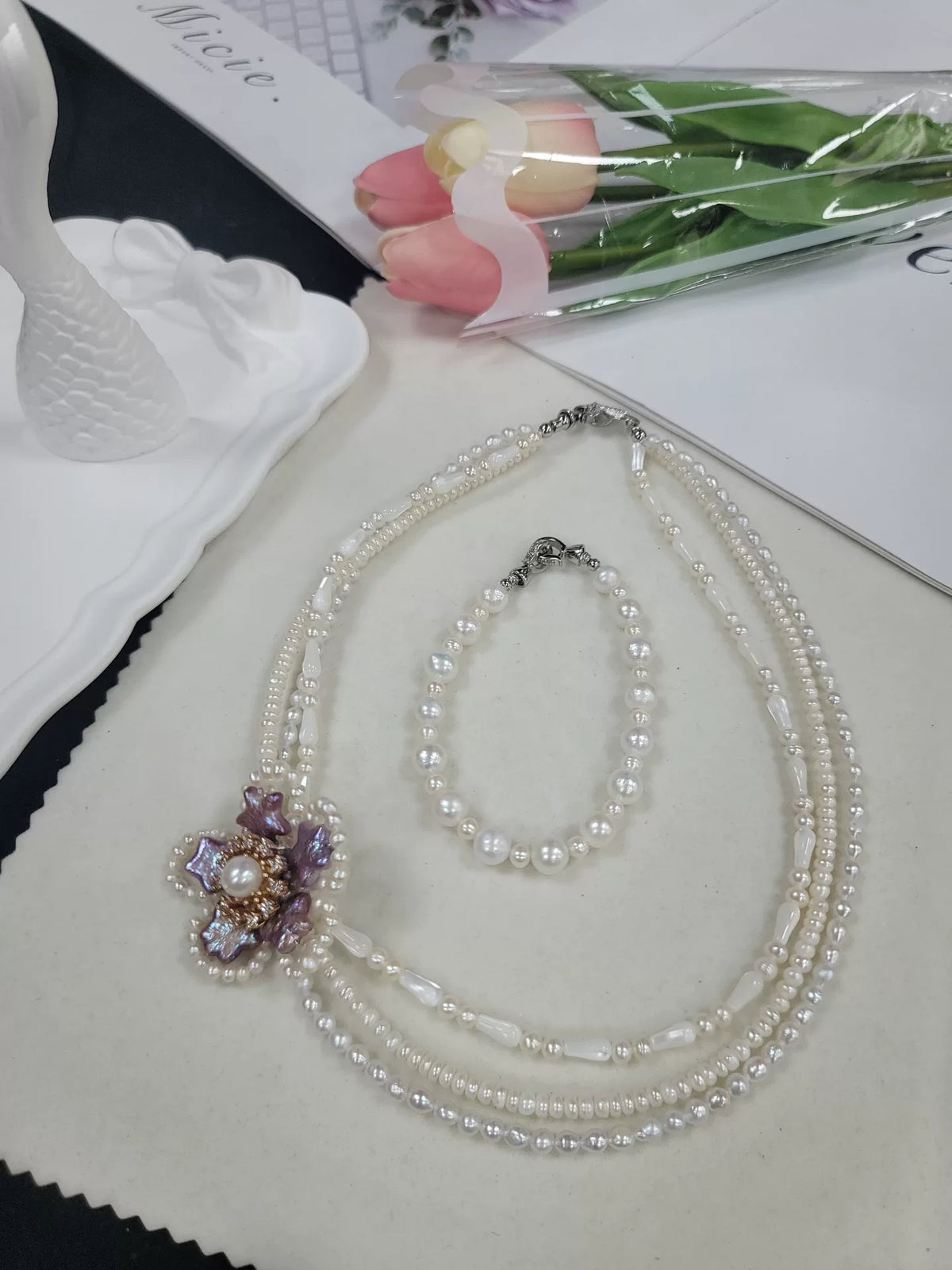Set collana e bracciale in perle d'acqua dolce