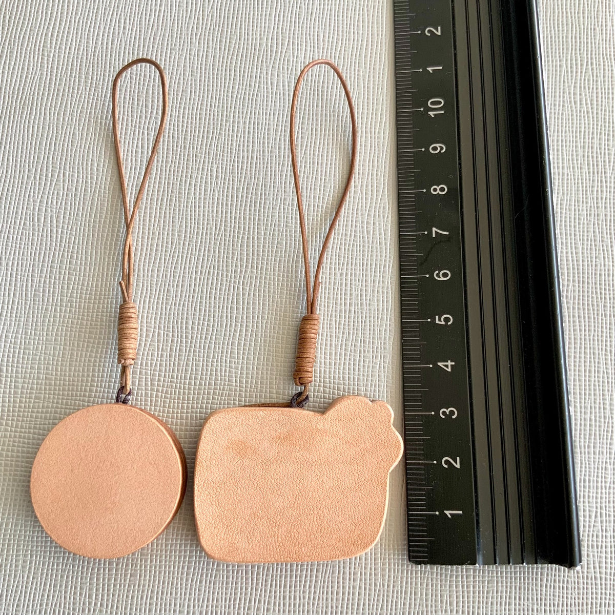 Leren Slang en Zon Charm Set