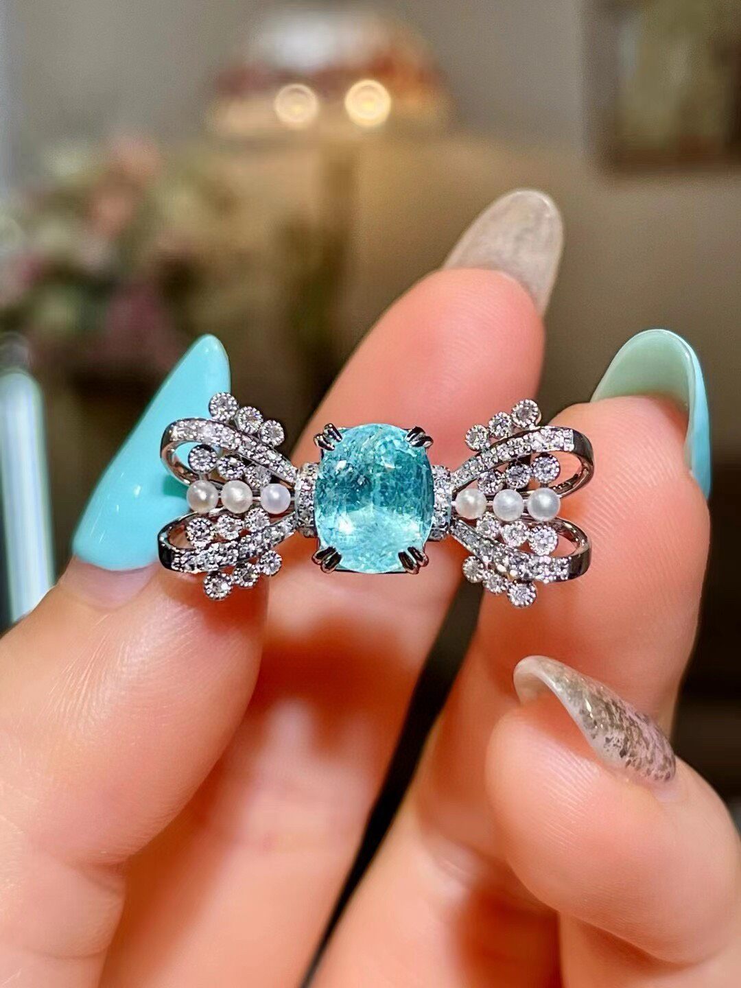 18k Gold Ring with Cushion-Cut Neon Blue Gem, Diamond and Pearl Bow-Tie Wings