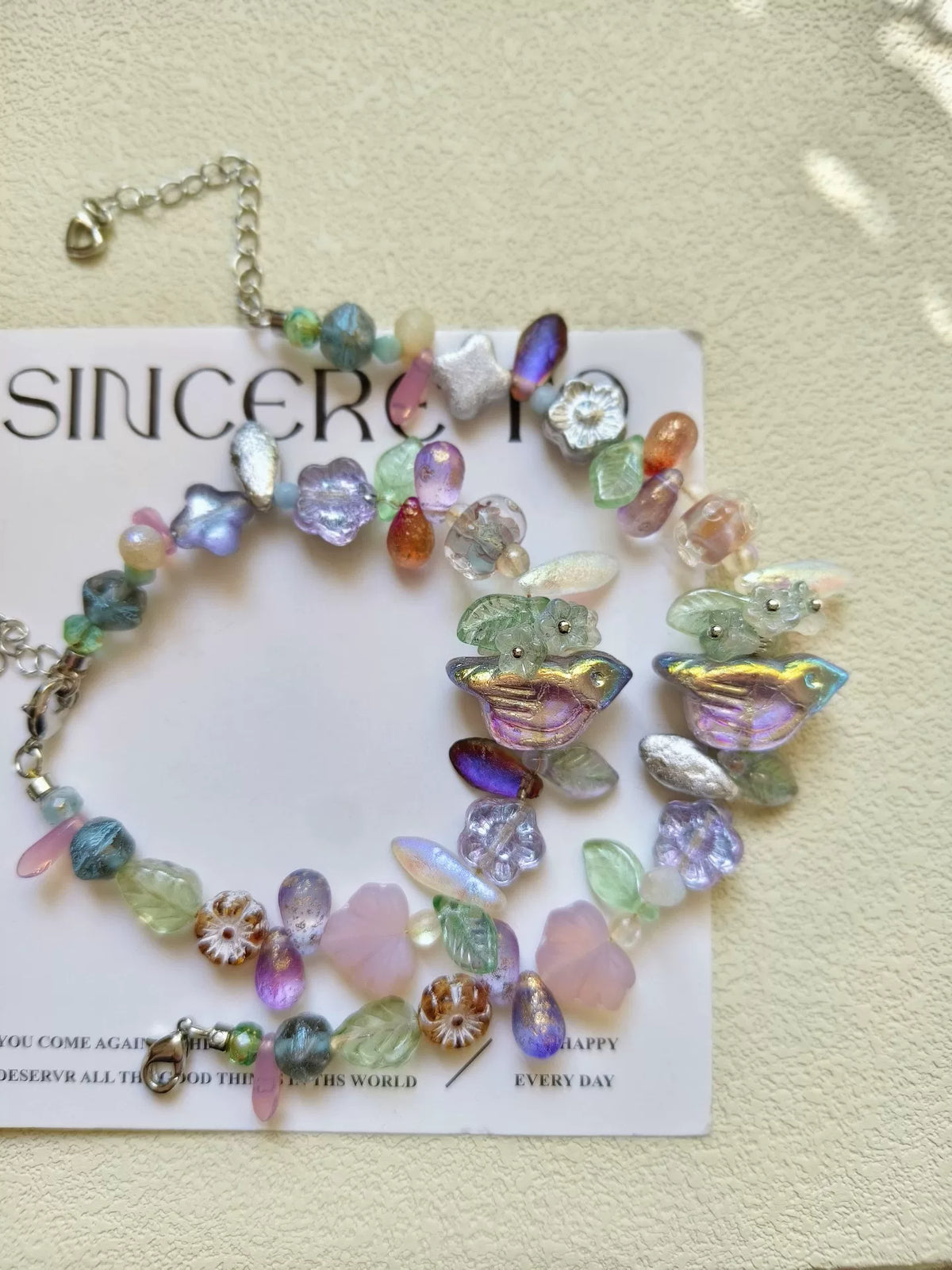 Bracelet oiseau en verre tchèque violet et or