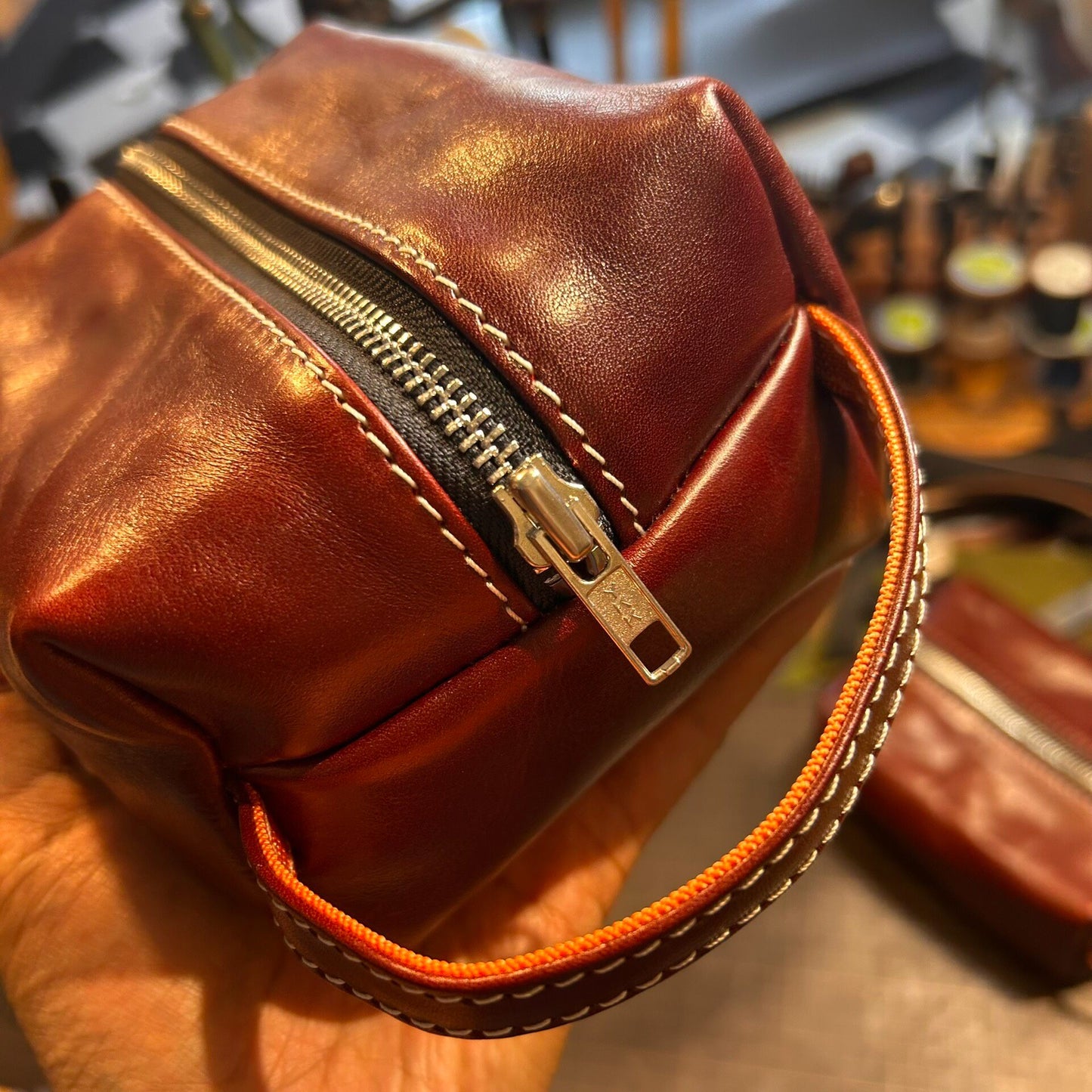 Reddish-Brown Full-Grain Leather Rectangular Pouch with Dual-Zipper Closure