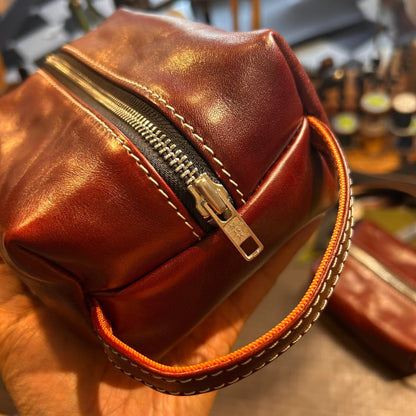 Reddish-Brown Full-Grain Leather Rectangular Pouch with Dual-Zipper Closure