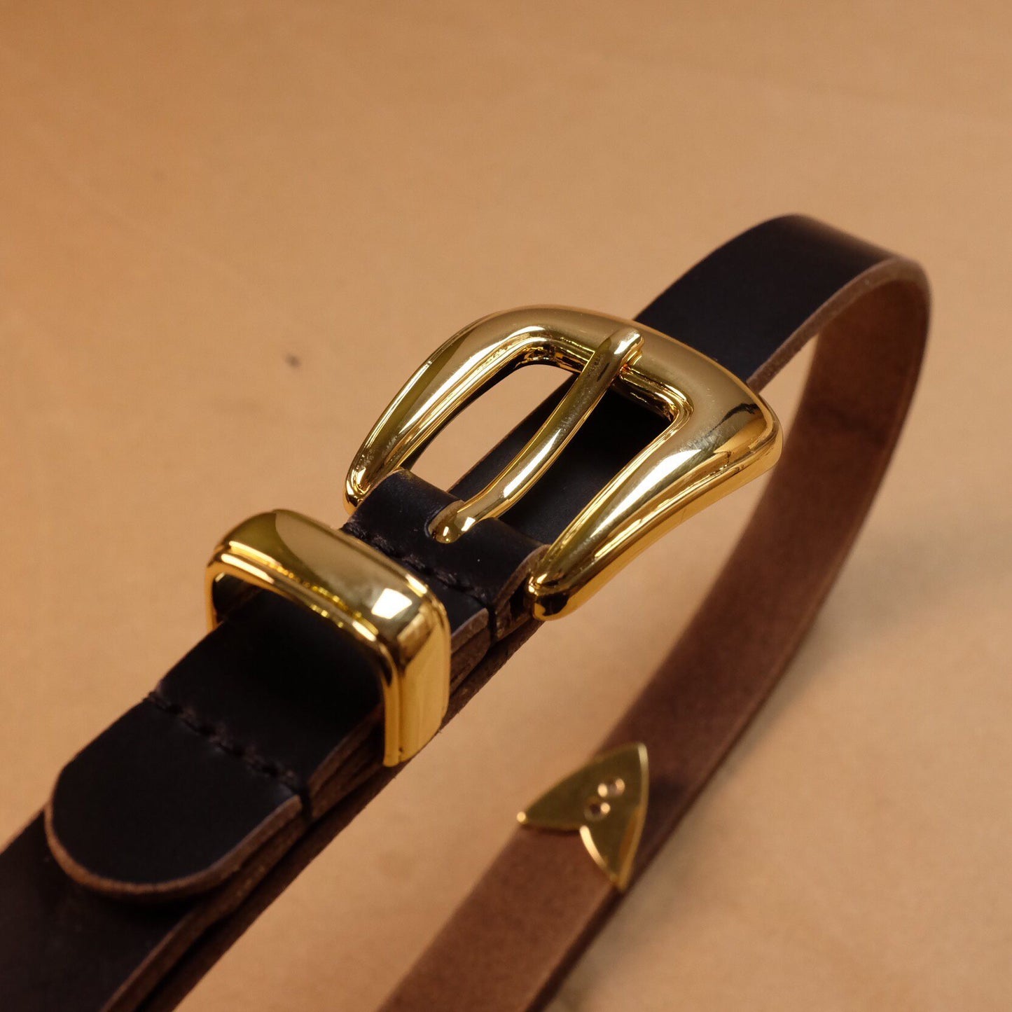 Matte Black Leather Belt with Gold-Tone Shield Buckle