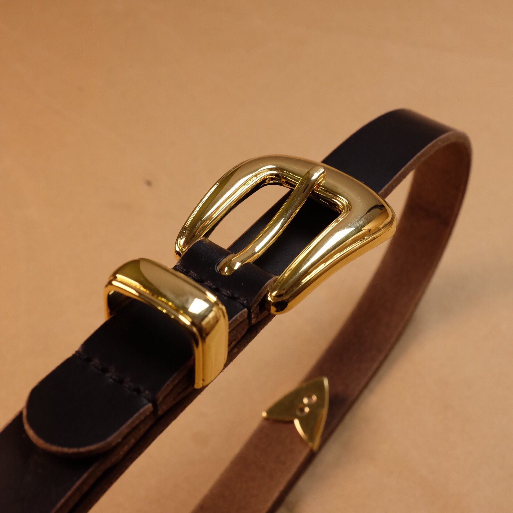 Matte Black Leather Belt with Gold-Tone Shield Buckle