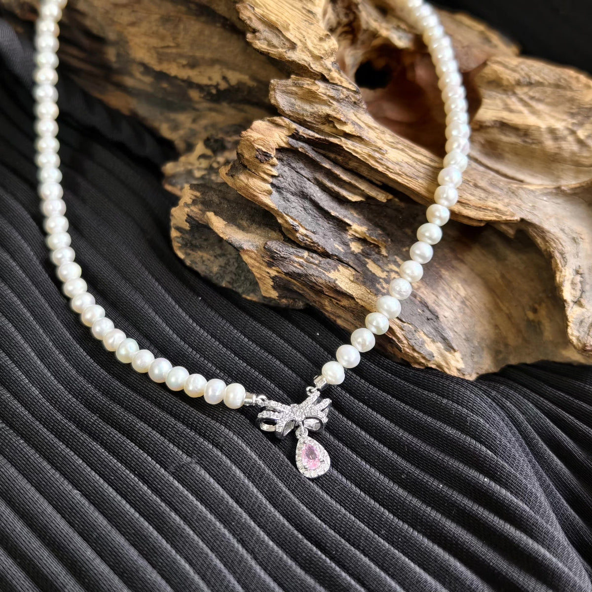 Pearl Necklace with Pink Bow Pendant