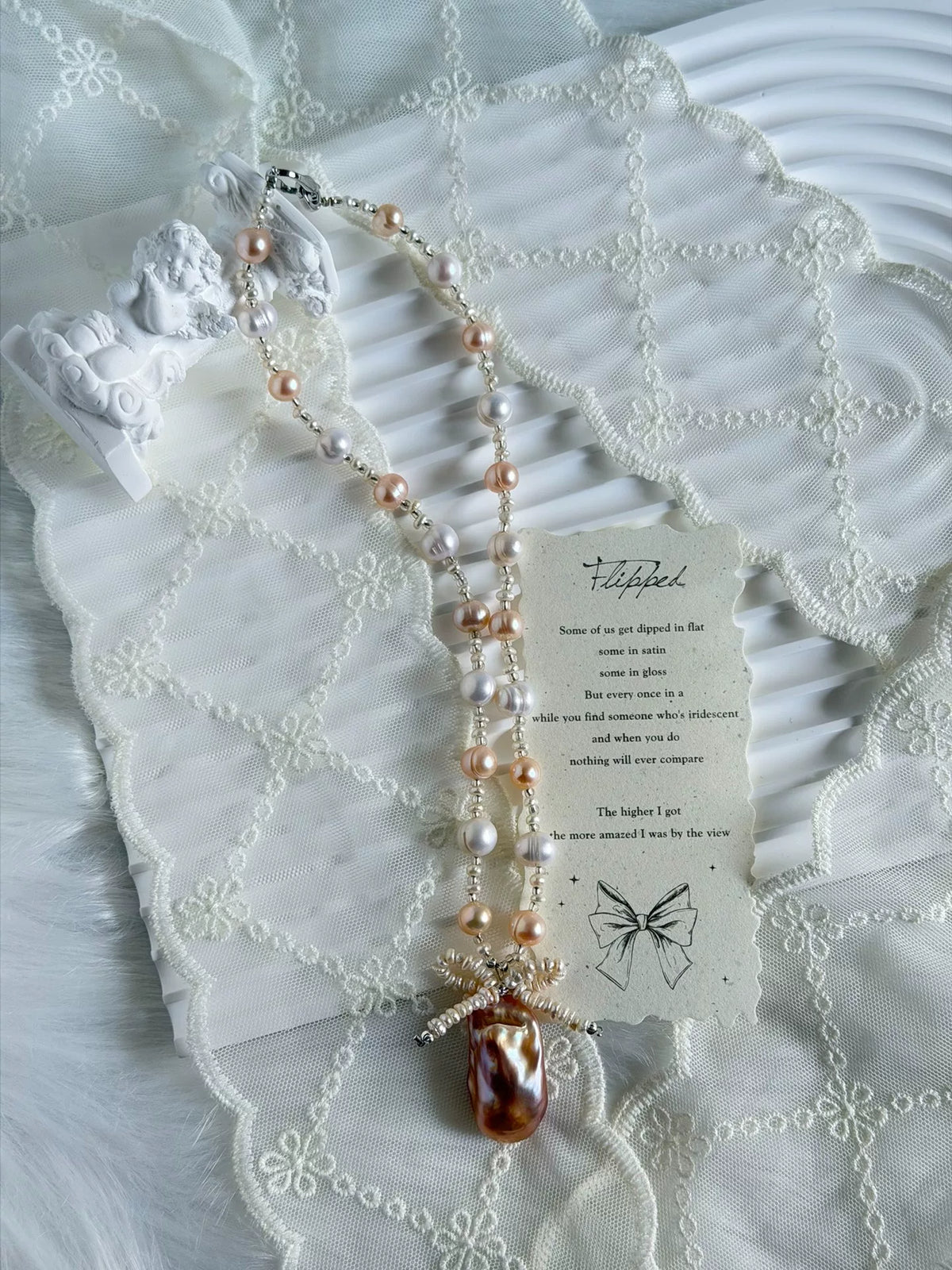 Collana con Pendente in Perla Barocca e Distanziatori Argentati