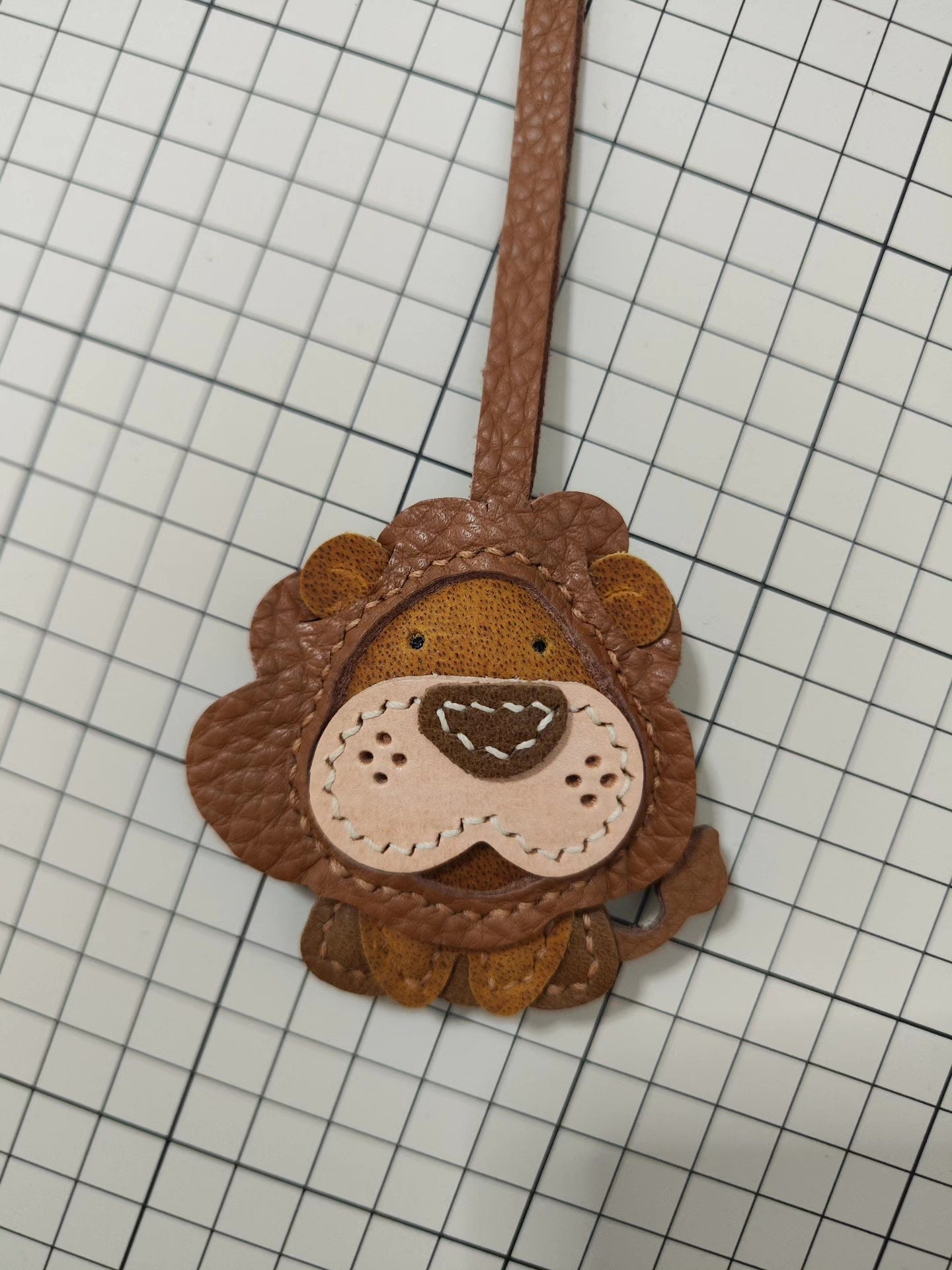 Lion-Shaped Leather Keychain with Detachable Paw Charm