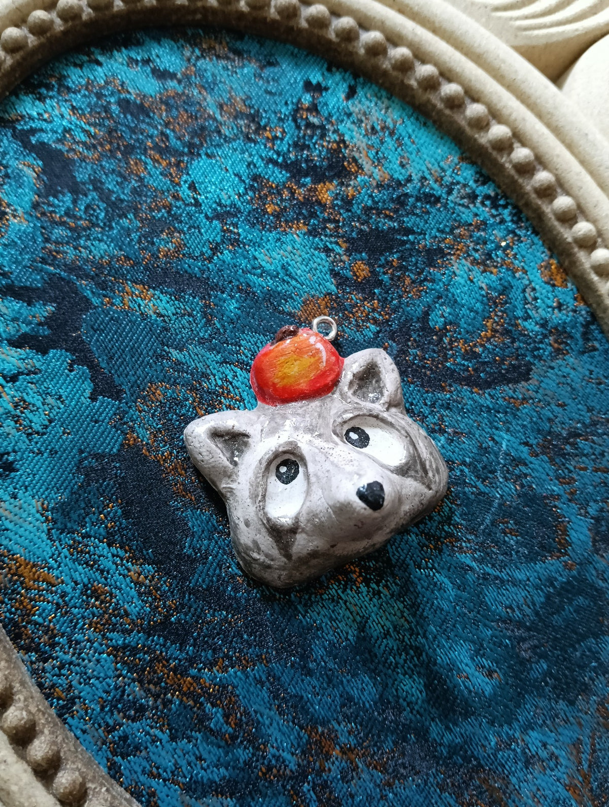 Handmade Clay Raccoon Pendant with Red Apple