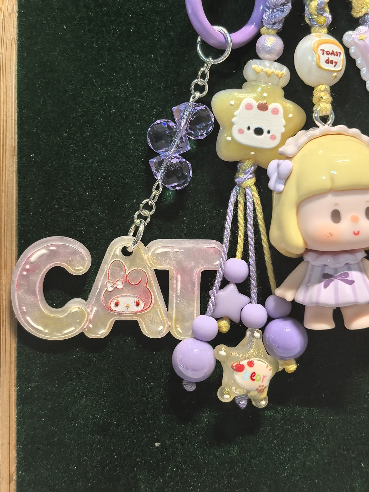 Glossy Figurine Phone Charm with Tassel