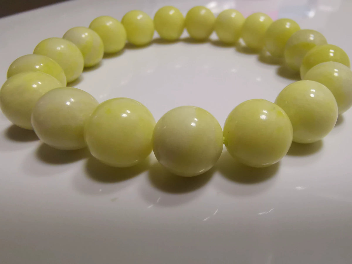 Blumenkohl-Jade Perlenarmband 10mm Blassgelbgrün