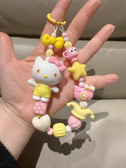 Sanrio White Cat Keychain with Yellow Outfit and Pastel Charms